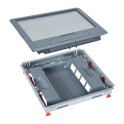 Kit caja de suelo compuesto por tapa de plástico rectangular y marco metálico con soportes para mecanismos en posición verti